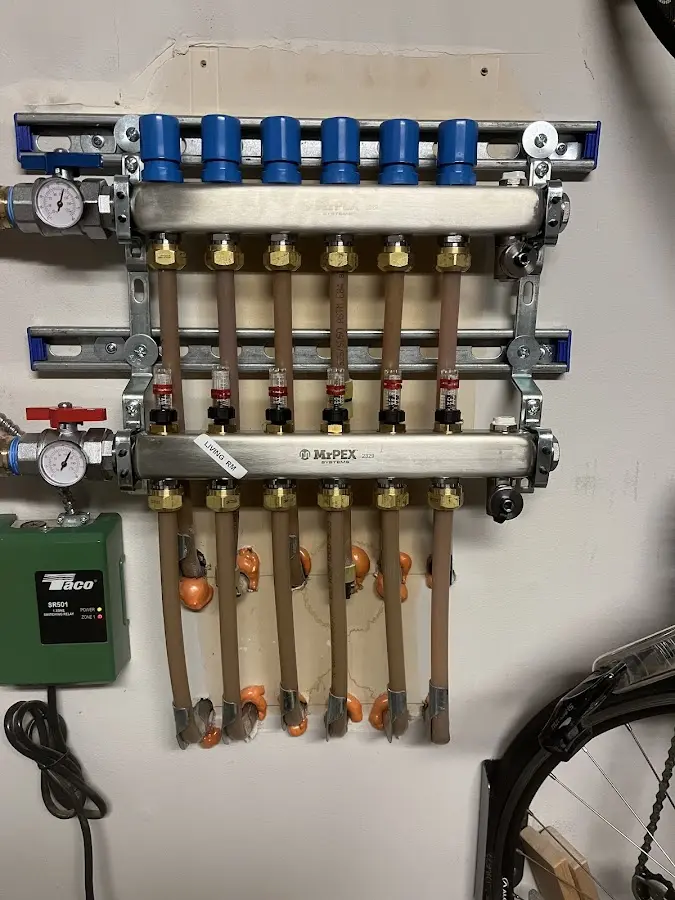 Plumber performing Water Heater Repair at a residential property in Orchard Mesa